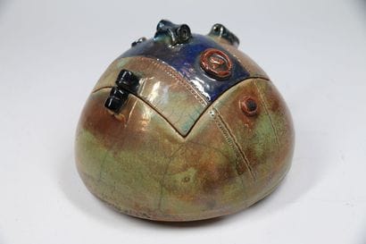 MODERN WORK
A globular stoneware vase with...