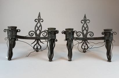 Set of six black-patinated wrought-iron wall...