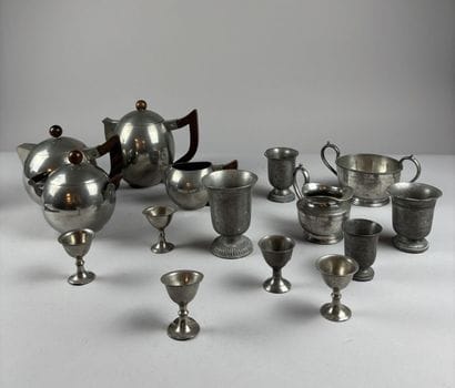 Spherical pewter tea set with rosewood handles...