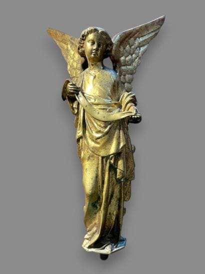 Small bronze angel with a speech bubble....