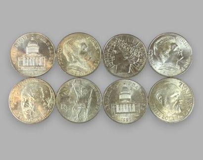 Eight 100-franc silver coins, including:
-...