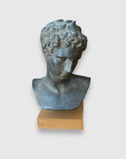 Faience bust of a man with a green patina...