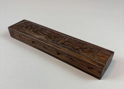 Set of three natural and carved wooden boxes,...