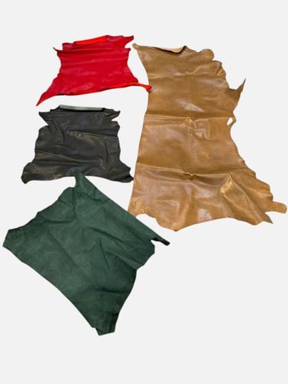 [LEATHER HANDLE]
Box containing goat hides...