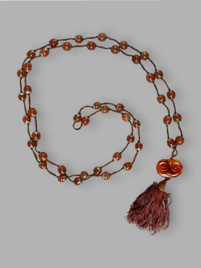 ASIA
Long necklace in silver plated metal...