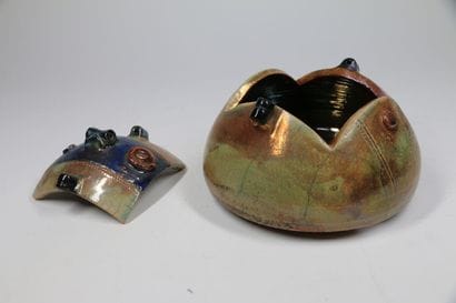 MODERN WORK
A globular stoneware vase with...