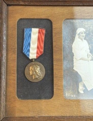 Photograph of a nurse dated 1919 and numbered...
