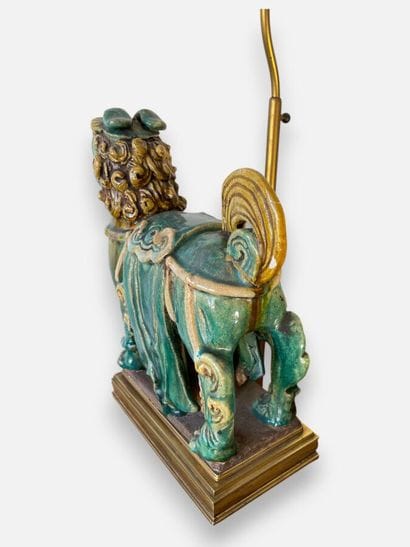 ASIA
Fô dog made of green and ochre glazed...