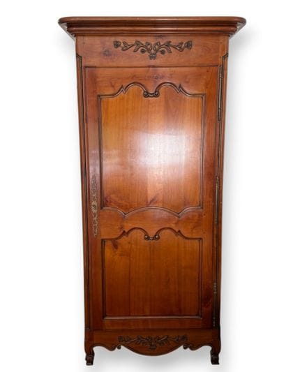 Cherry wood cabinet with molded panels and...