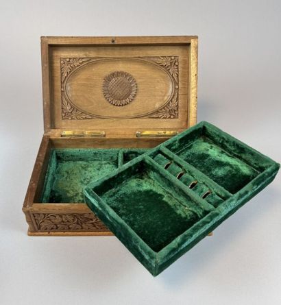 Set of three natural and carved wooden boxes,...