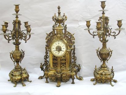 Garniture de cheminée en bronze doré dans...