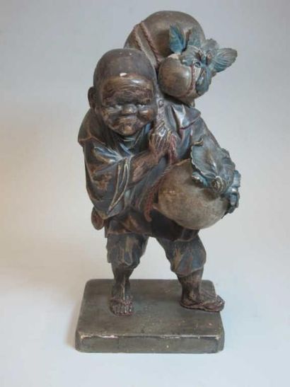 JAPON - XIXE SIÈCLE
Statuette de paysan debout...