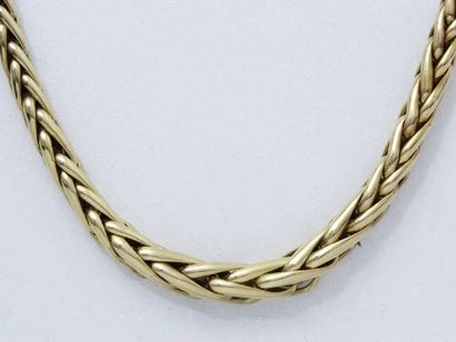 Collier composé d'une chute en or 18 K, maille...