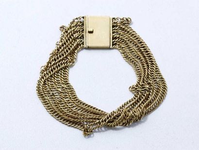Bracelet en or 18 K, composé de 5 rangs de...