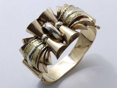 Important bracelet manchette 2 ors 18 K estampés...
