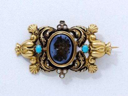 Broche en or 18 K estampé partiellement émaillé...