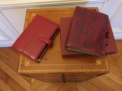 Cartier et Filofax
Lot de 2 agendas:1 Cartier...