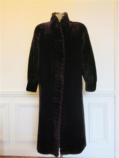 Yves ST LAURENT
Manteau teddy marron T.4...