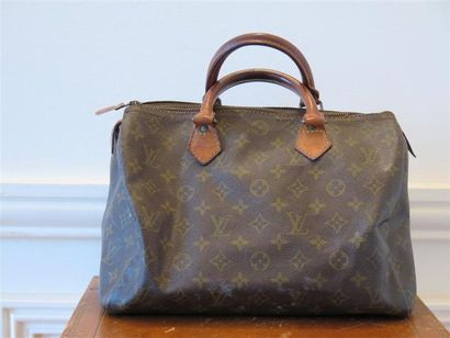 LOUIS VUITTON
Sac speedy;dans l'état