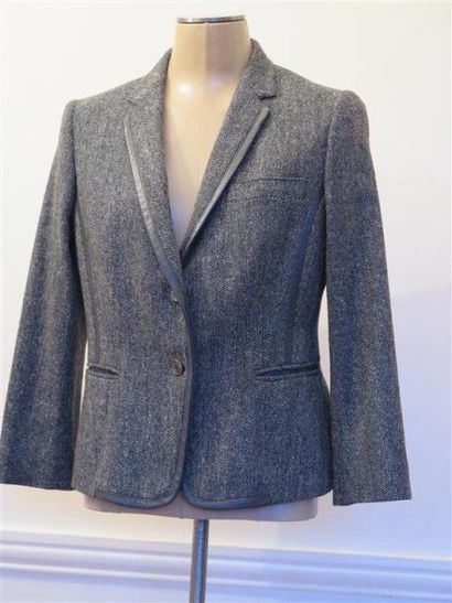 DOLCE GABBANA
Veste tweed gris,intérieur...