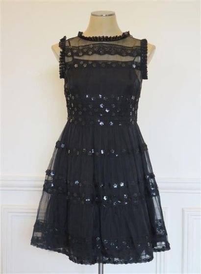 RED VALENTINO
Très jolie robe de tulle et...