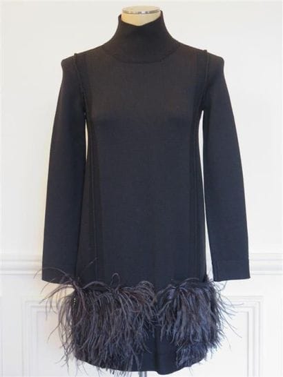 LOUIS VUITTON
Tunique en laine noire, bordée...