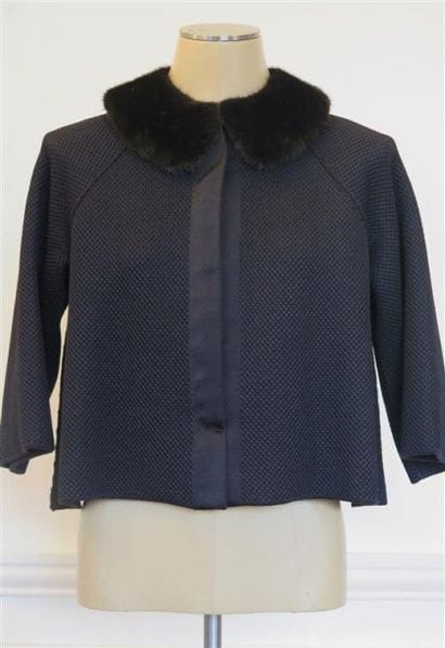 LOUIS VUITTON
Veste courte, ample,col vison...