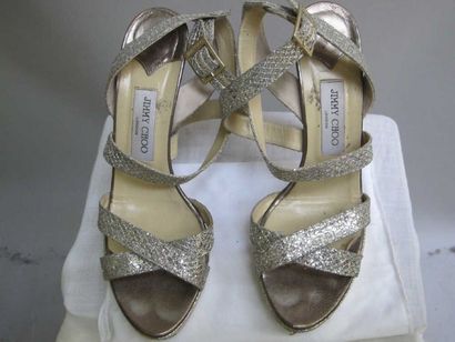 Jimmy Choo. Paire de sandales argent, talons...