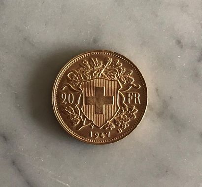 1 monnaie en or: 20 francs suisses