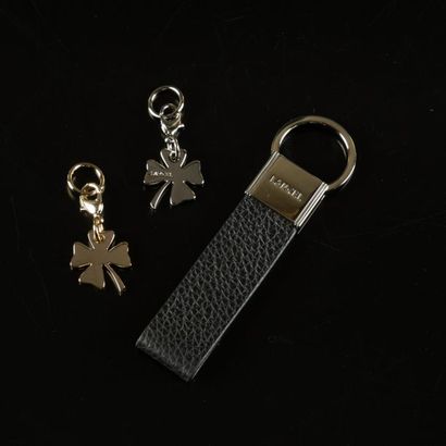 LANCEL. Ensemble de trois accessoires : un...
