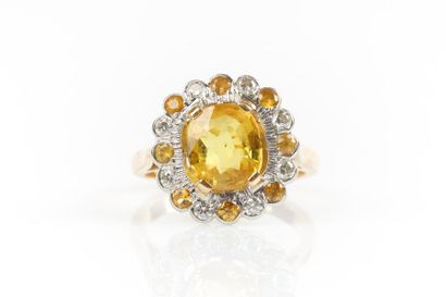 Bague marguerite en or de deux tons sertie...