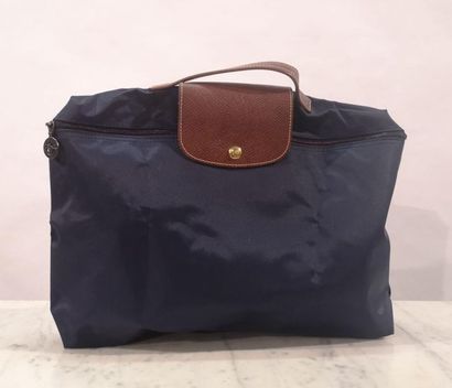 LONGCHAMP. Porte documents, serviette pliable...