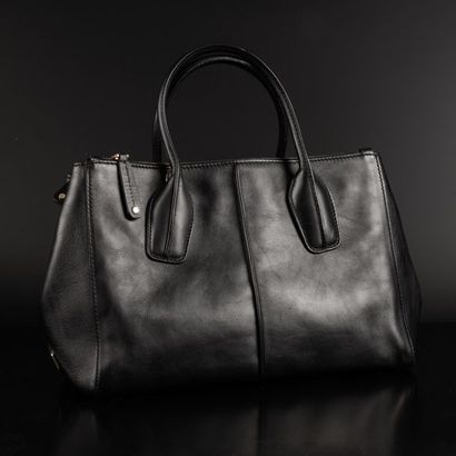 TOD'S. Sac à main en cuir noir. Haut. 20,...