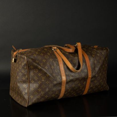 LOUIS VUITTON. Sac de voyage en toile Monogram....