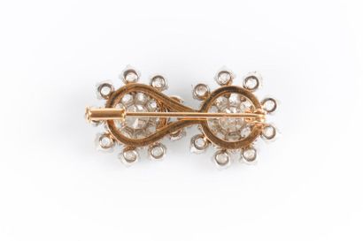 Broche double rosace en or de deux tons sertie...