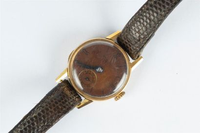 BAUME ET MERCIER. Bracelet-montre de dame...