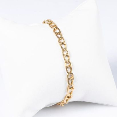 Gourmette en or maille plate. 12,49 g. Long....