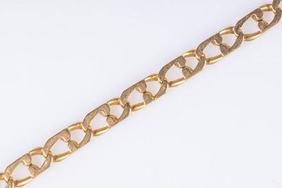 Gourmette en or maille plate. 12,49 g. Long....