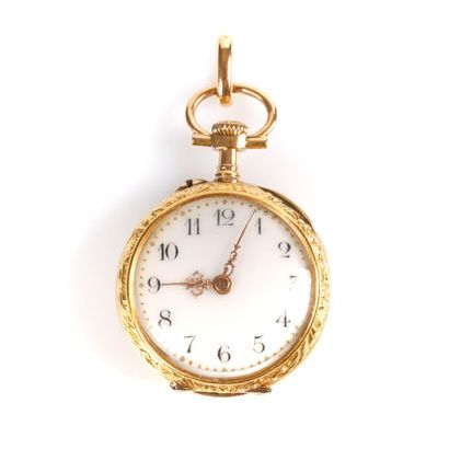 Montre de col en or sertie d'un petit diamant...
