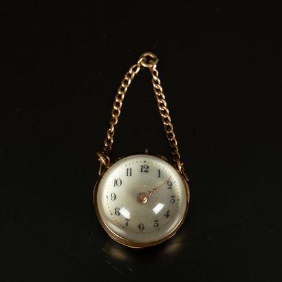 Montre pendentif sphérique montée en or,...