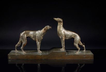 C. CHARLES
Deux lévriers
Bronze. Signé sur...