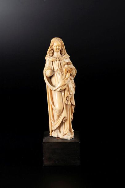 Vierge à l'Enfant en ivoire sculpté, dos...