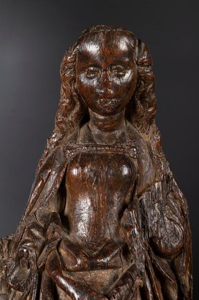 Sainte Barbe en chêne sculpté avec infimes...