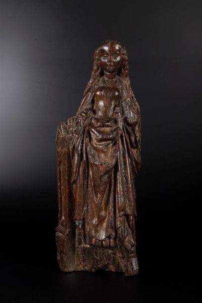 Sainte Barbe en chêne sculpté avec infimes...