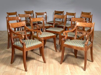 Suite de douze chaises et deux fauteuils...