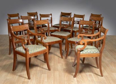 Suite de douze chaises et deux fauteuils...
