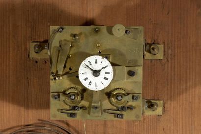 Tableau pendule: personnage devant un village,...