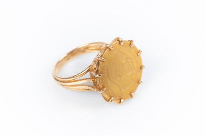 Bague en or sertie d'une monnaie de 10 FF-...