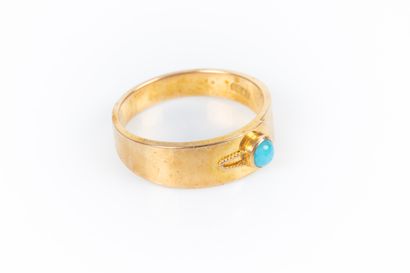 Bague en or sertie d'une turquoise. 14 K....