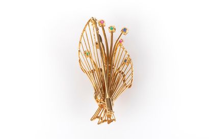 Broche bouquet en or sertie de petites pierres...
